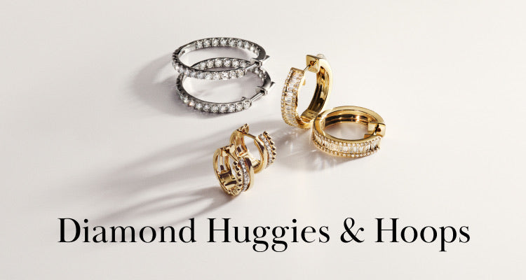 Four pairs of diamond-studded hoop earrings, two in silver and two in gold, displayed on a white surface with the text “Diamond Huggies & Hoops” below.