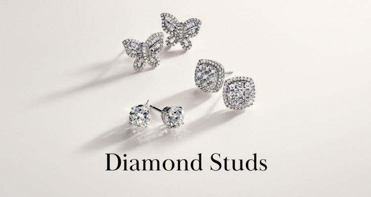 Three pairs of diamond stud earrings—one pair shaped like butterflies, one with square halos, and one with classic round settings—are displayed on a light background above the text Diamond Studs.